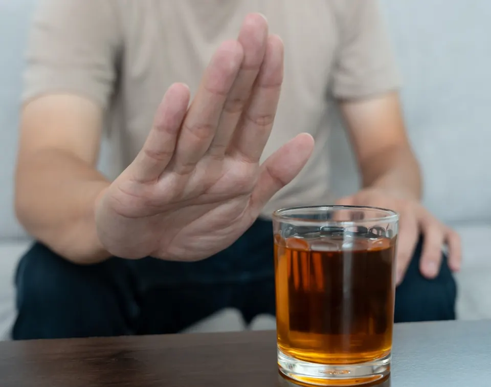 A patient talking with a provider about alcohol treatment options