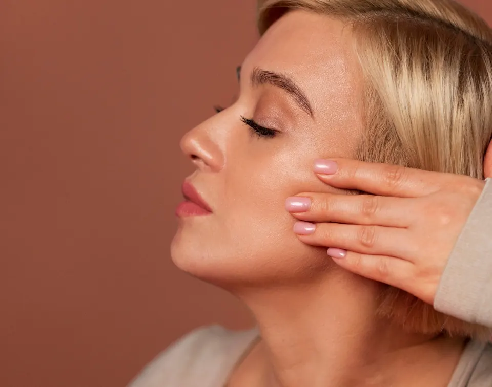 Provider performing a facial contouring filler treatment