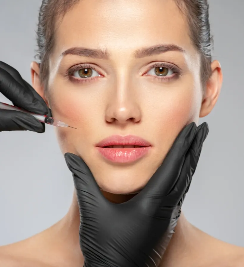 A provider performing a precise injectable treatment at Functional Wellness & Aesthetics