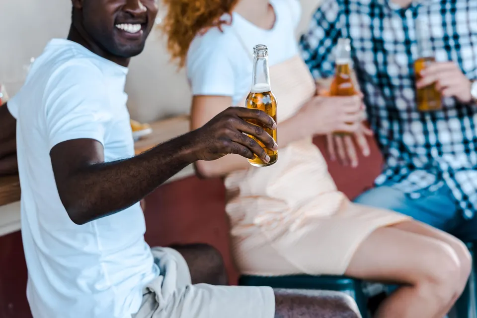Person holding a drink