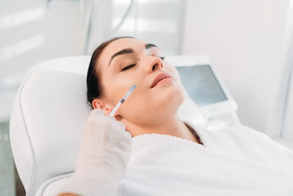 Provider performing a microneedling treatment